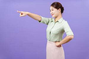 Photo of young Asian woman on purple background