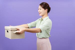 Photo of young Asian woman on purple background