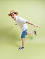 Photo of young Asian man on green background