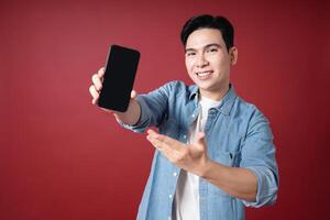 Photo of young Asian man on background