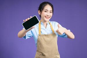 Image of young Asian woman on background photo