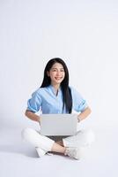 Photo of young Asian girl on white background