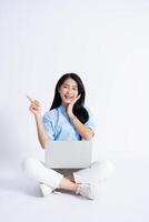 Photo of young Asian girl on white background