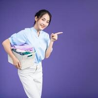 Image of young Asian woman on background photo