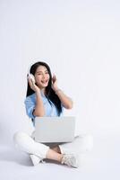 Photo of young Asian girl on white background