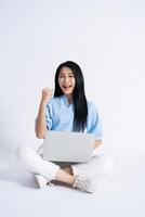 Photo of young Asian girl on white background
