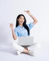 Photo of young Asian girl on white background