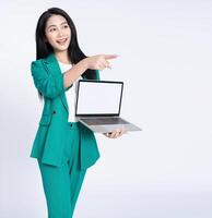 Portrait of young Asian business woman on white background photo
