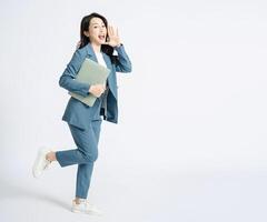 Image of young Asian business woman on background photo