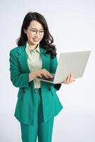 Image of young Asian business woman on background photo