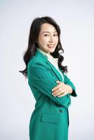 Image of young Asian business woman on background photo