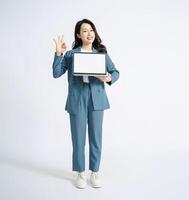 Image of young Asian business woman on background photo