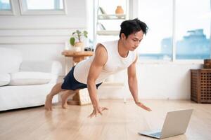 Photo of young Asian man at home