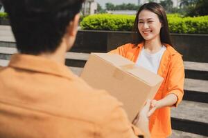 Photo of young Asian couple working together