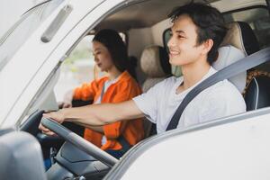 Photo of young Asian couple working together