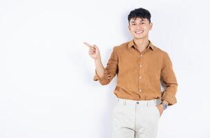 Photo of young Asian businessman on white background