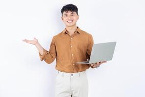 Photo of young Asian businessman on white background