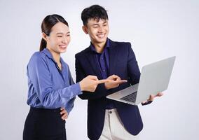 Photo of two young Asian business people on white background