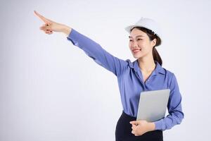 Photo of young Asian businesswoman on white background