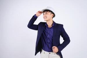 Photo of young Asian business man on white background