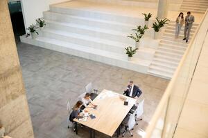 Aerial view at young startup team working in the office photo