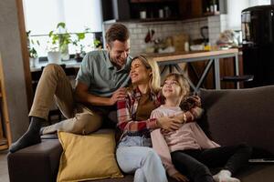 Cozy family bonding moment in a warm living room photo