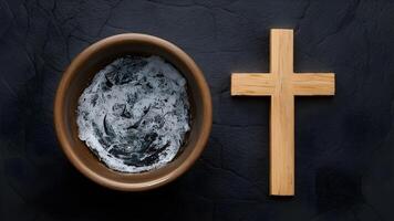 Ash Wednesday Concept Bowl with Ash and Holy Cross photo