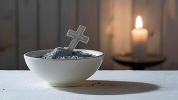 Ash Wednesday Concept Bowl with Ash and Holy Cross photo