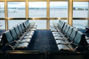 Aeroport Waiting Area with Control Tower in the background photo