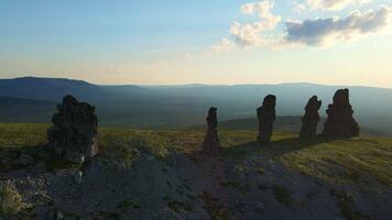 Aerial. Weathered stone pillars on the Manpupuner plateau. Tourist attraction video