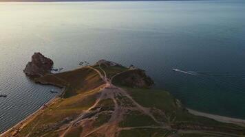Aerial. Cape Burkhan is a cape on the west coast of Olkhon Island on Lake Baikal video