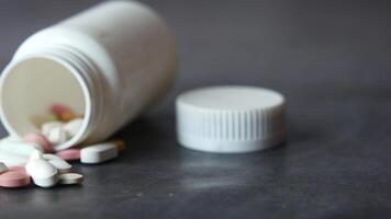 Close up of many colorful pills and capsules video