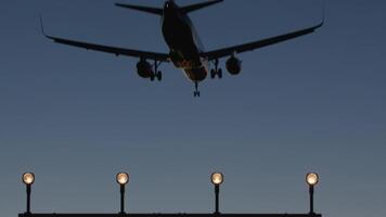 Airplane against dusk sky video