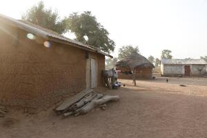 Village in the north of Benin with the name Kalale. The tribal people have their own language and live from farming. Many houses are mud houses. photo