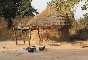 Village in the north of Benin with the name Kalale. The tribal people have their own language and live from farming. Many houses are mud houses. photo