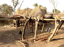 Village in the north of Benin with the name Kalale. The tribal people have their own language and live from farming. Many houses are mud houses. photo