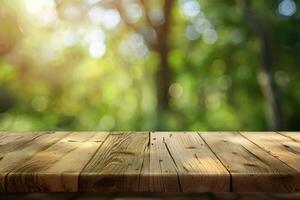 Wood table top on blurred green background can be used for montage or display your products photo