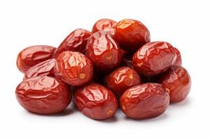 Shiny red dried jujubes isolated on a white backdrop. Ziziphus fruit in a dried state for snacking. Concept of healthful eating, sugar-free treats, and dietary wellness. Chinese red date fruit photo