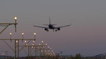 Airplane approach dusk lights video