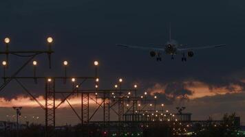 Airplane landing at dusk video