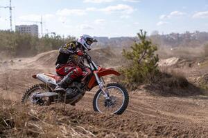 Kharkov. Ukraine March 2021 Moto cross training Enduro bike ride off road track photo