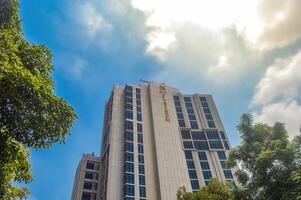 A modern highrise building belonging to the Platinum Hotel on Jalan Tunjungan Surabaya, Indonesia, 2 March 2024. photo