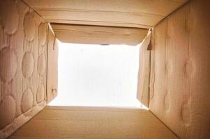 from inside an empty cardboard box with copy space photo