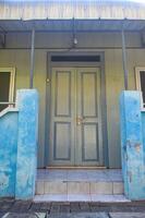 the front door of a Dutch East Indies style house in Indonesia.the front door of a Dutch East Indies style house in Indonesia. photo