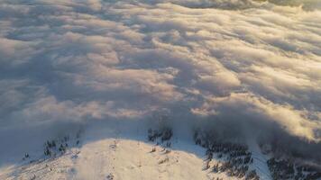 Snowy expanse cloudy sky aerial view showcasing winter nature finest Winter nature blend serenity majesty embodying spirit north. Winter nature north cold captivating serene majestic. video