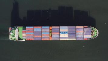 Aerial. top view of a container ship with a cargo of container video