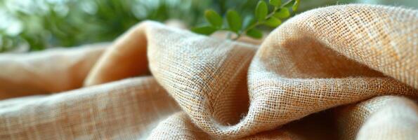 Cloth Close-Up With Plant in Background photo