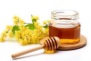 Jar of honey and jasmine flowers on a white background. photo