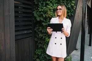 Business woman use digital tablet photo