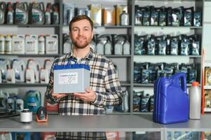 Smiling Salesman Auto Parts Store photo